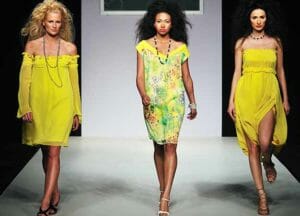 three women in yellow dresses