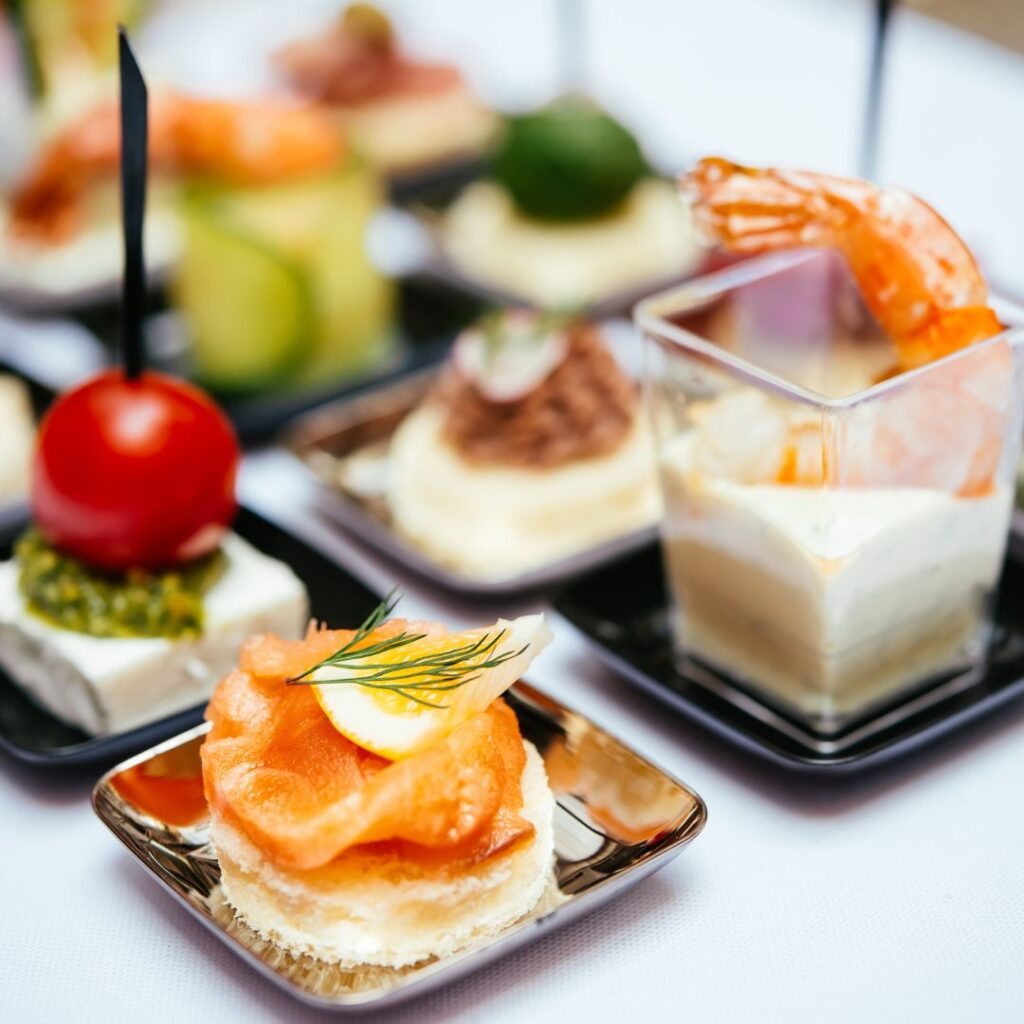 A table with several different types of food on it.