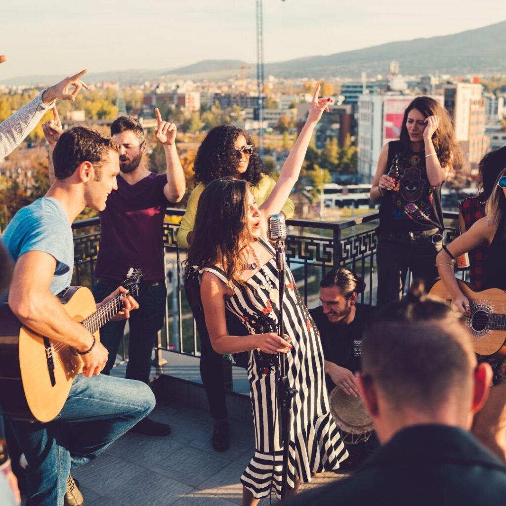 A group of people standing on top of a building.