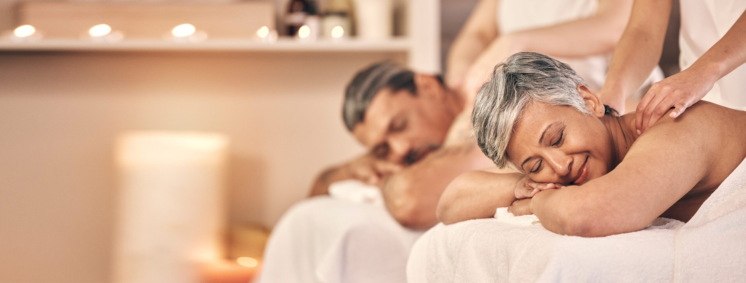 Older couple enjoying a massage.